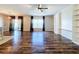 Spacious living room featuring hardwood floors and abundant natural light at 627 Lucerne Blvd, Winter Haven, FL 33881