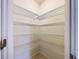 Well-lit pantry with ample shelving for storage at 627 Lucerne Blvd, Winter Haven, FL 33881
