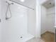 Clean shower with tile surround and a built-in shower rod at 627 Lucerne Blvd, Winter Haven, FL 33881