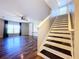 Staircase leading to the upper level of the home at 627 Lucerne Blvd, Winter Haven, FL 33881
