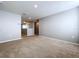 Spacious upstairs hallway with light gray walls and carpeted floors at 627 Lucerne Blvd, Winter Haven, FL 33881
