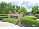 Community dog park with a statue and well-maintained landscaping at 720 Siena Palm Dr # 202, Celebration, FL 34747