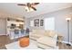 Open concept living room, kitchen, breakfast bar, and seating area at 720 Siena Palm Dr # 202, Celebration, FL 34747