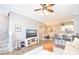 Spacious living room with open floor plan and kitchen views at 720 Siena Palm Dr # 202, Celebration, FL 34747