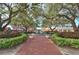 Brick pathway leads to a charming town square fountain and shops at 720 Siena Palm Dr # 202, Celebration, FL 34747