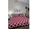 King-size bed in a well-lit bedroom at 796 Del Prado Dr, Kissimmee, FL 34758