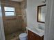 Clean bathroom with shower, toilet and vanity at 1420 Ne 22Nd St, Ocala, FL 34470