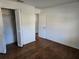 Bright bedroom with wood floors and ample closet space at 1420 Ne 22Nd St, Ocala, FL 34470