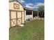 Backyard view of shed and porch at 306 Medina Ct, Kissimmee, FL 34758