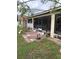 Backyard with shed and screened porch at 306 Medina Ct, Kissimmee, FL 34758