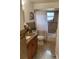 Clean bathroom with tub, shower, and tile floor at 306 Medina Ct, Kissimmee, FL 34758