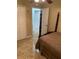Second bedroom with a double bed and access to a bathroom at 306 Medina Ct, Kissimmee, FL 34758