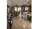 Eat-in kitchen with a center island and wood cabinets at 306 Medina Ct, Kissimmee, FL 34758