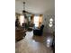 Spacious living room with comfortable seating and large windows at 306 Medina Ct, Kissimmee, FL 34758
