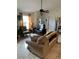 Spacious living room with comfy seating and large windows at 306 Medina Ct, Kissimmee, FL 34758
