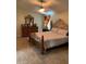Large main bedroom with a comfortable bed and plenty of dresser space at 306 Medina Ct, Kissimmee, FL 34758