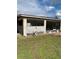 Screened porch with small patio and yard at 306 Medina Ct, Kissimmee, FL 34758