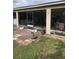 Screened porch with patio and backyard view at 306 Medina Ct, Kissimmee, FL 34758