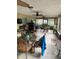 Spacious screened porch with seating and backyard access at 306 Medina Ct, Kissimmee, FL 34758