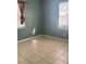 Bright bedroom with tile floors and window coverings at 3407 Avenue J Nw, Winter Haven, FL 33881