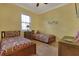 Bedroom with two twin beds and a dresser at 5043 Vantage Ct, St Cloud, FL 34772