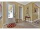 Bright and spacious entryway with tile flooring and a decorative rug at 5043 Vantage Ct, St Cloud, FL 34772