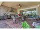 Enjoy this outdoor kitchen with stone accents and ample seating at 5043 Vantage Ct, St Cloud, FL 34772