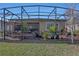 Large screened patio perfect for outdoor dining and relaxing at 5043 Vantage Ct, St Cloud, FL 34772