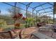 Spacious screened lanai with ample seating and shade at 5043 Vantage Ct, St Cloud, FL 34772