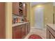 Wet bar with wine rack and granite countertop at 5043 Vantage Ct, St Cloud, FL 34772
