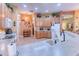 Modern kitchen featuring Corian countertops and stainless steel appliances at 521 Milano Rd, Kissimmee, FL 34759