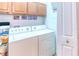 Convenient laundry room with washer and dryer at 521 Milano Rd, Kissimmee, FL 34759