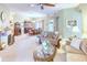 Open concept living area with comfortable seating and formal dining area at 521 Milano Rd, Kissimmee, FL 34759