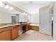 Spa-like bathroom with soaking tub and double vanity at 8958 Sugar Palm Rd, Kissimmee, FL 34747