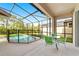 Enjoy this relaxing screened pool and patio area, perfect for outdoor entertaining at 8958 Sugar Palm Rd, Kissimmee, FL 34747