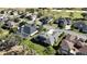 Aerial view of houses and a golf course at 1280 Osprey Landing Dr, Lakeland, FL 33813