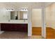 Bathroom boasts a double vanity and ample closet space at 1280 Osprey Landing Dr, Lakeland, FL 33813