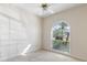 Bright bedroom with arched window and ceiling fan at 1280 Osprey Landing Dr, Lakeland, FL 33813