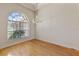 Bright dining room with hardwood floors and large arched window at 1280 Osprey Landing Dr, Lakeland, FL 33813