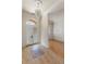 Elegant entryway with tile flooring, high ceilings, and a chandelier at 1280 Osprey Landing Dr, Lakeland, FL 33813