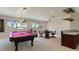 Game room with pool table, wet bar, and seating area at 1280 Osprey Landing Dr, Lakeland, FL 33813