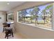 Game room with large windows overlooking a golf course at 1280 Osprey Landing Dr, Lakeland, FL 33813