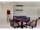 Game room with a wet bar and adjacent bathroom at 1280 Osprey Landing Dr, Lakeland, FL 33813