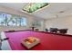 Game room with pool table, game table, and large windows at 1280 Osprey Landing Dr, Lakeland, FL 33813