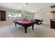 Spacious game room with pool table and wet bar at 1280 Osprey Landing Dr, Lakeland, FL 33813