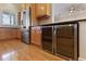 Kitchen boasts stainless steel appliances and wine cooler at 1280 Osprey Landing Dr, Lakeland, FL 33813
