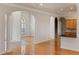 Spacious kitchen with hardwood floors, granite counters, and stainless steel appliances at 1280 Osprey Landing Dr, Lakeland, FL 33813