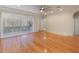 Bright living room with hardwood floors and plantation shutters at 1280 Osprey Landing Dr, Lakeland, FL 33813
