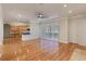 Spacious living room featuring hardwood floors and large windows at 1280 Osprey Landing Dr, Lakeland, FL 33813