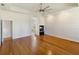 Main bedroom with hardwood floor, fireplace and access to ensuite bath at 1280 Osprey Landing Dr, Lakeland, FL 33813